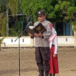 Polsek Muara Pawan Hadiri Upacara di.SDN 13.Di Jalan Tanjung Belandang