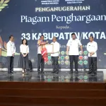 Peresmian Posbankum Desa/Kelurahan se-Sumut, Wabup Terima Piagam Penghargaan dari Menteri Hukum RI