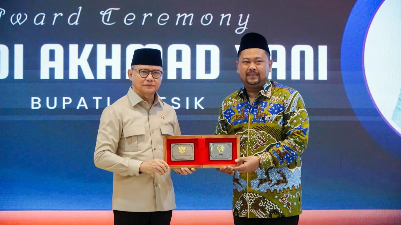 Bawa Model Perlindungan Anak PMI ke Forum Nasional, Bupati Yani Terima Penghargaan Kepala Daerah Inspiratif