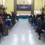 Pengesahan Warga Baru PSHT Cabang Sampang Berjalan Khidmat dan Tertib di Aula SMK 2