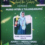 Aurel Saliq Zahira, Siswi MTsN 2 Tulungagung Raih Medali Emas Juara 1 Bahasa Inggris KANOSM Tingkat Nasional 2026