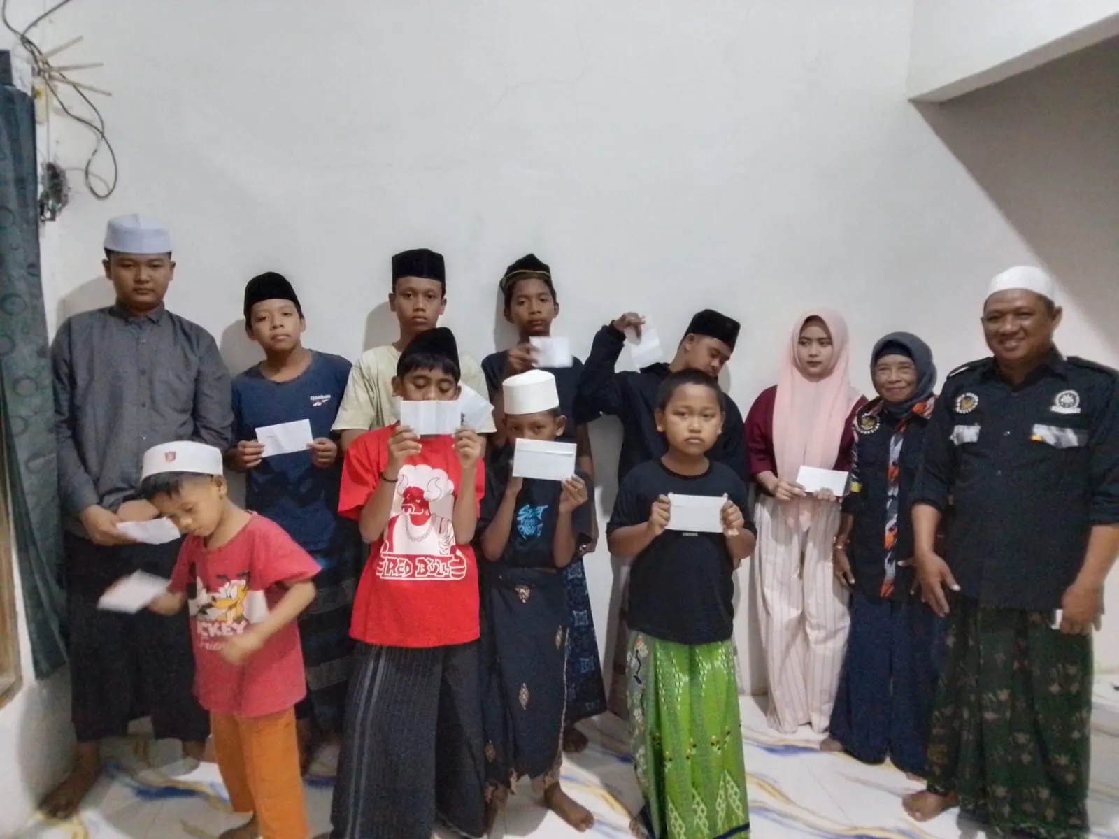 GMBI Gresik Turun Langsung ke Rumah Warga, Santuni Anak Yatim-Piatu dan Dhuafa di Metatu